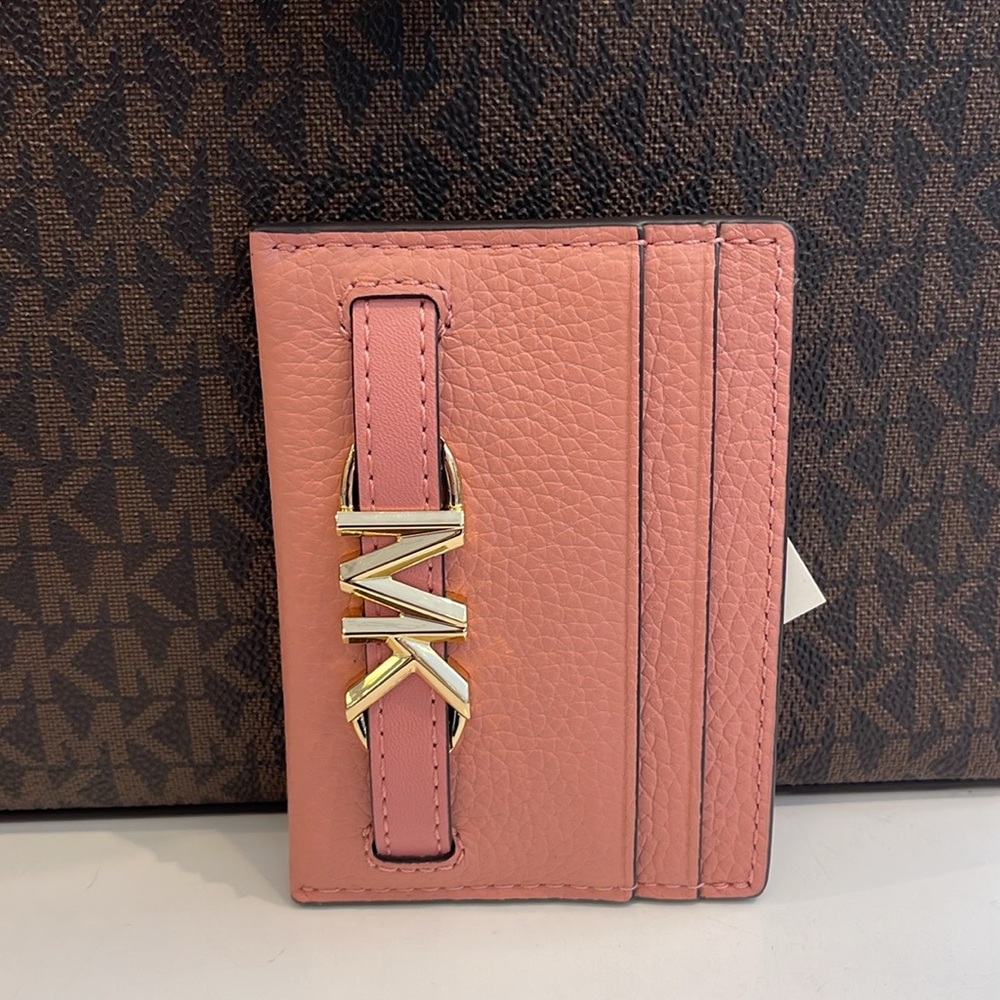 MICHAEL KORS
Reed Large Pebbled Leather Card Holder Case
Primrose 
NWT - Picture 8 of 16